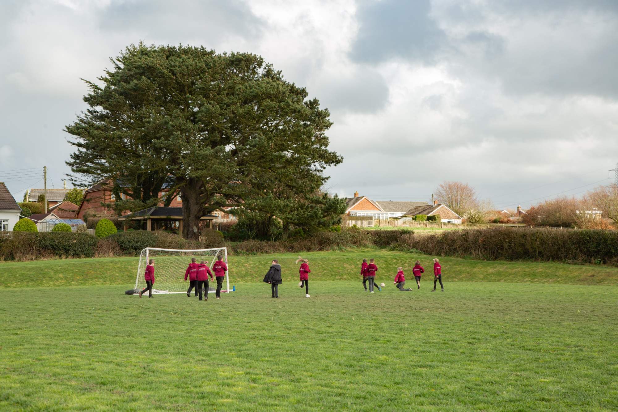 children playing football