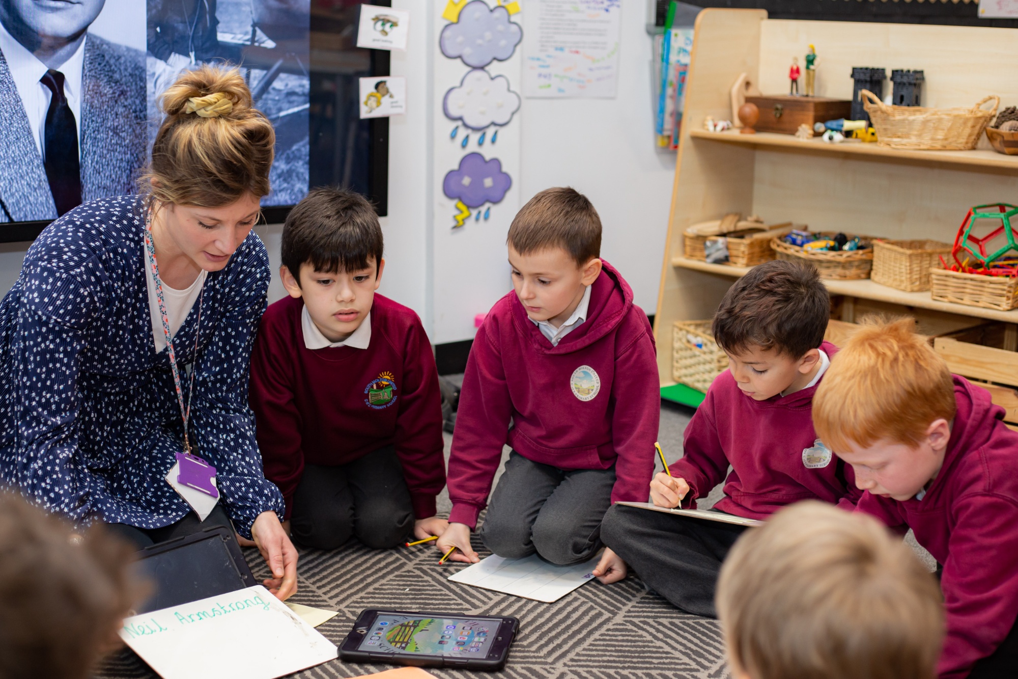 children and teacher in class