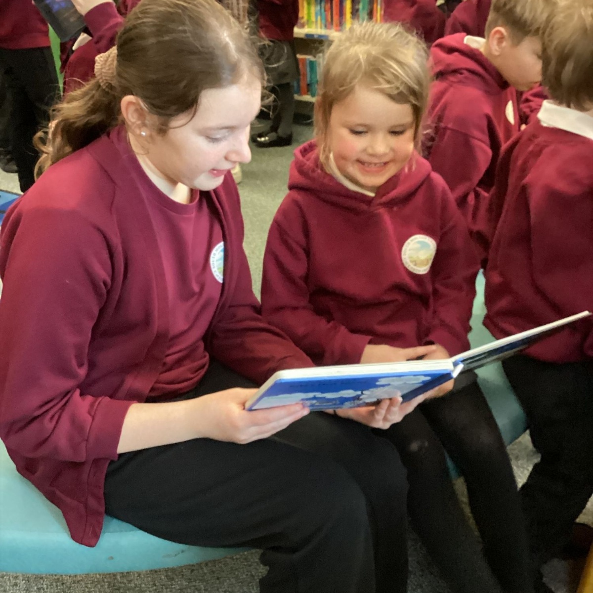 South Molton United CofE Primary School Reading buddies library visit